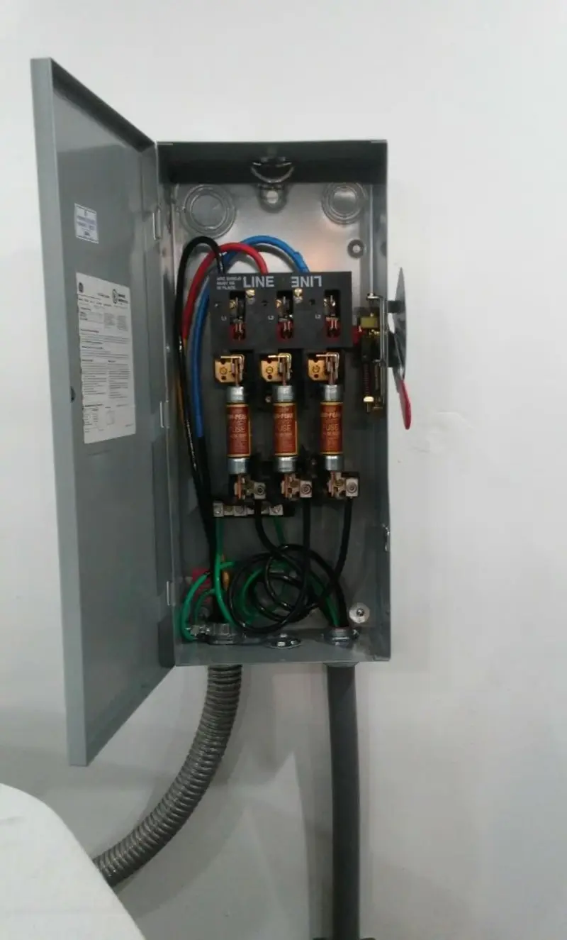 Three-phase disconnect switch installed for Smoke Detector Installation in East Rockaway